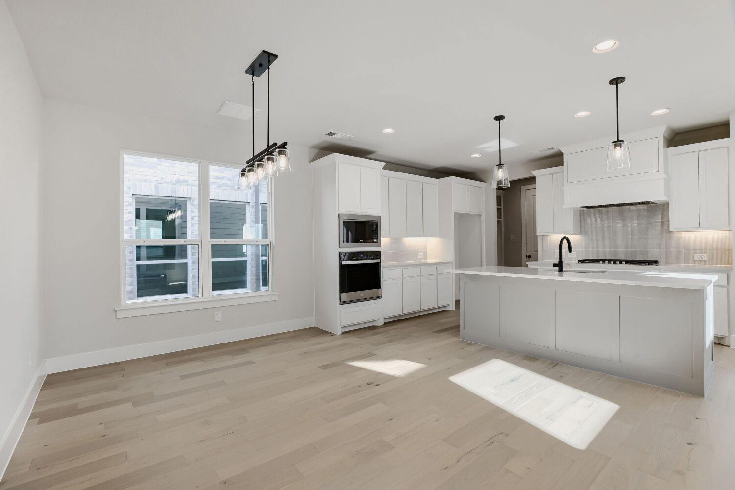 Plan 1604 Representative Photo of Dining Area and Kitchen
