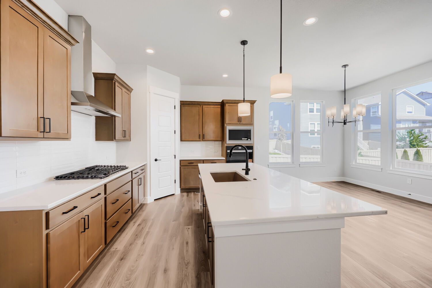 Plan C410 Representative Photo - Kitchen/Dining Area