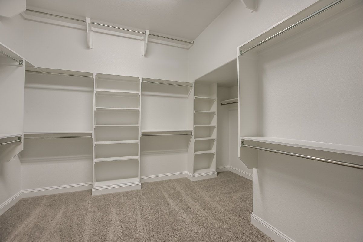 Plan 634 Primary Closet Representative Image