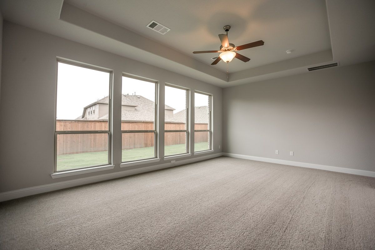 Plan 1509 Primary Bedroom Representative Image