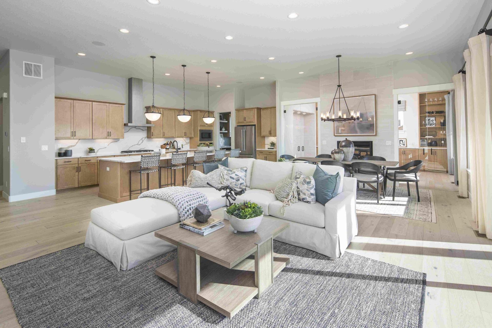 Plan C652 Living/Kitchen/Dining Photo by American Legend Homes
