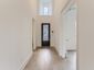 casa en Sweetgrass 80s por American Legend Homes