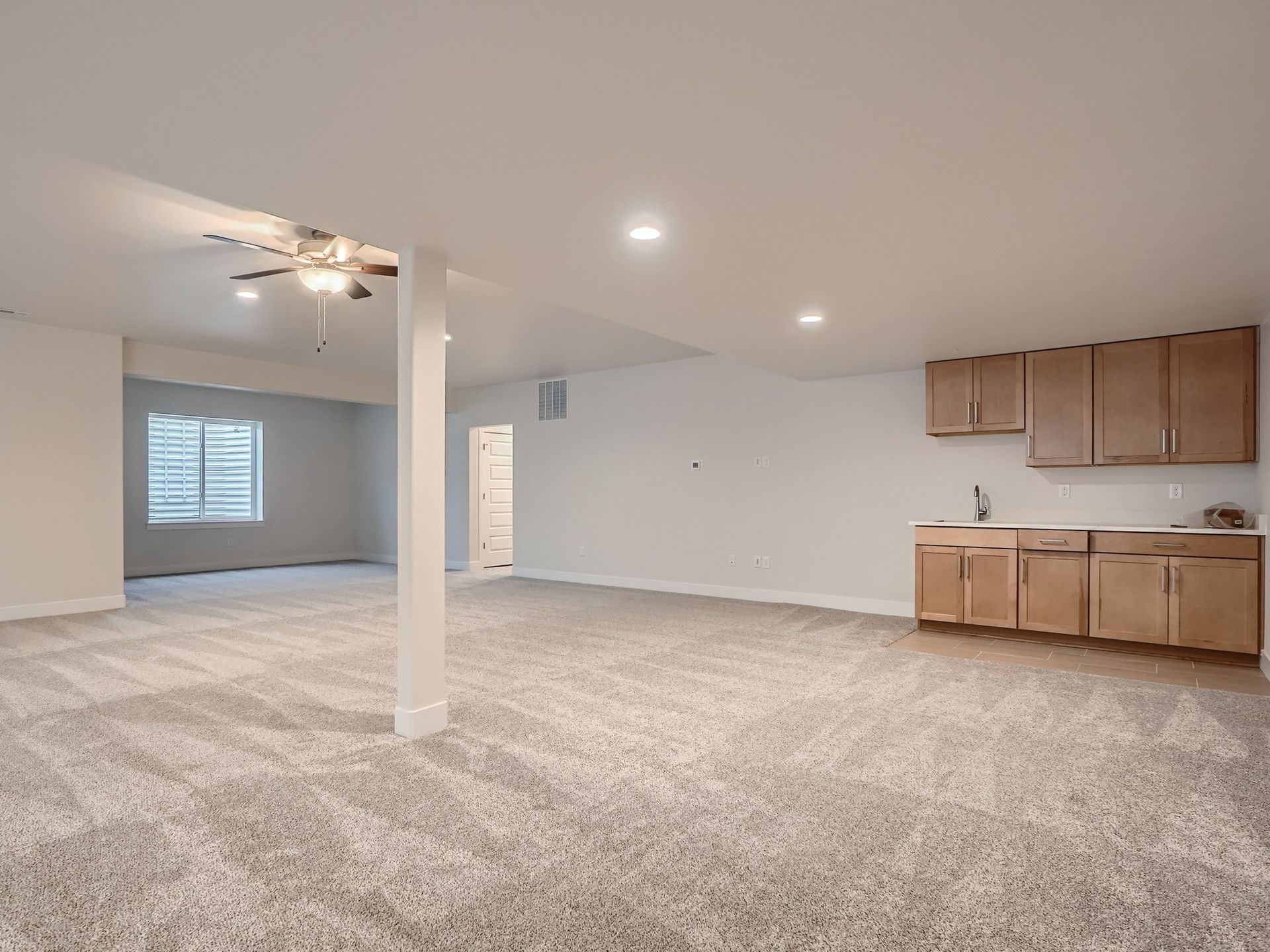Plan C655 Finished Basement Representative Photo