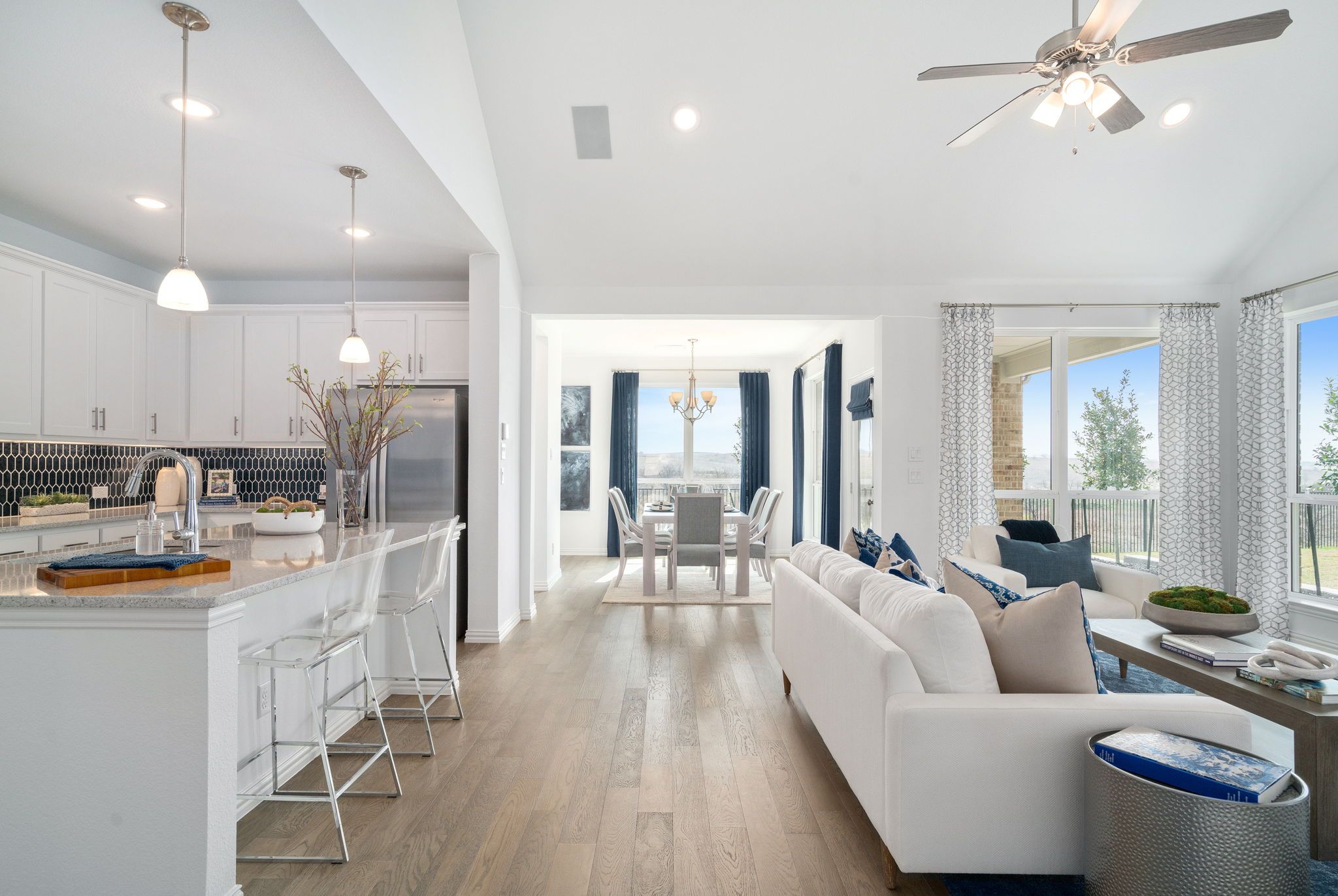 Plan 1523 Kitchen/Living/Dining Photo by American Legend Homes