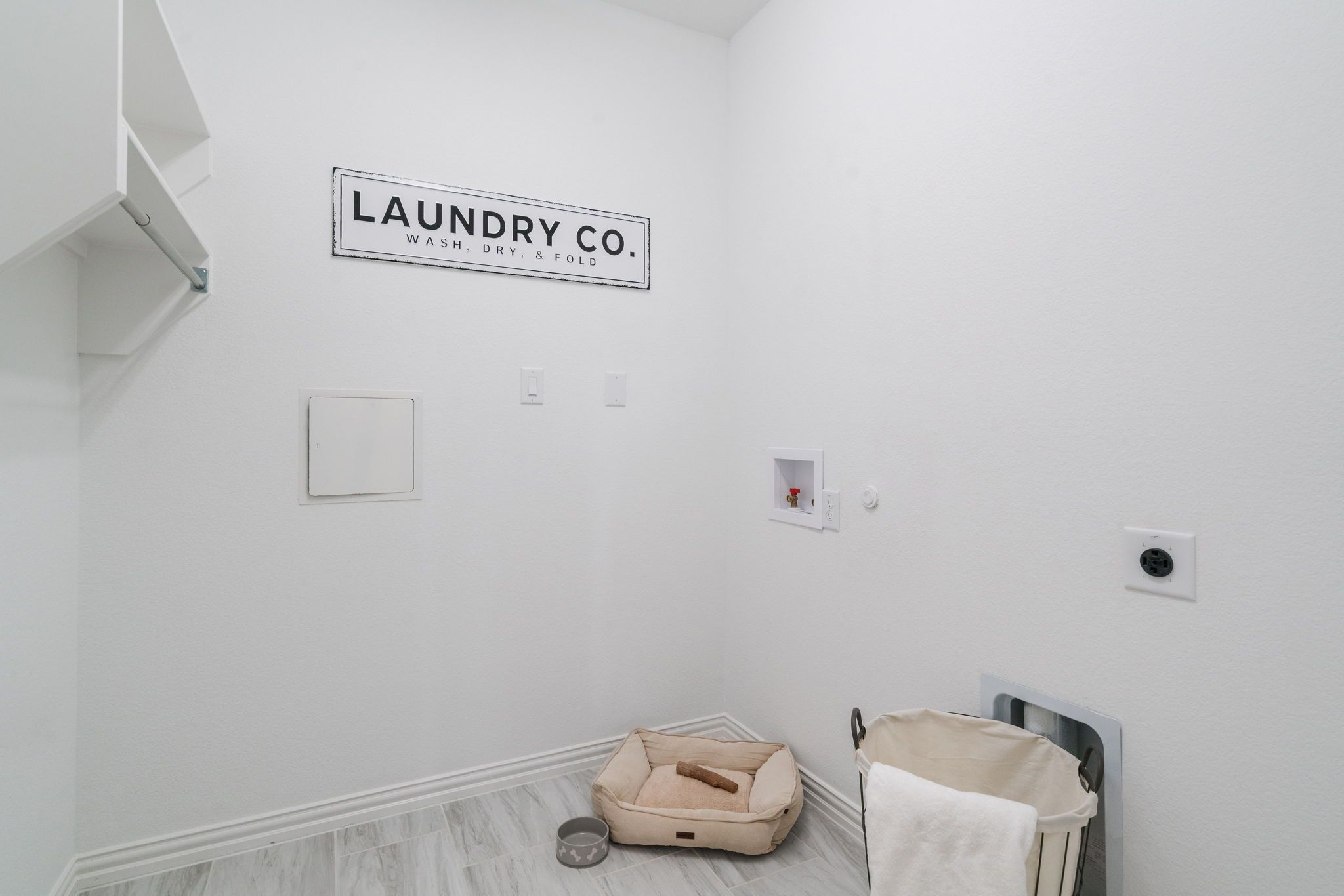 Plan 1523 Laundry Room Photo by American Legend Homes