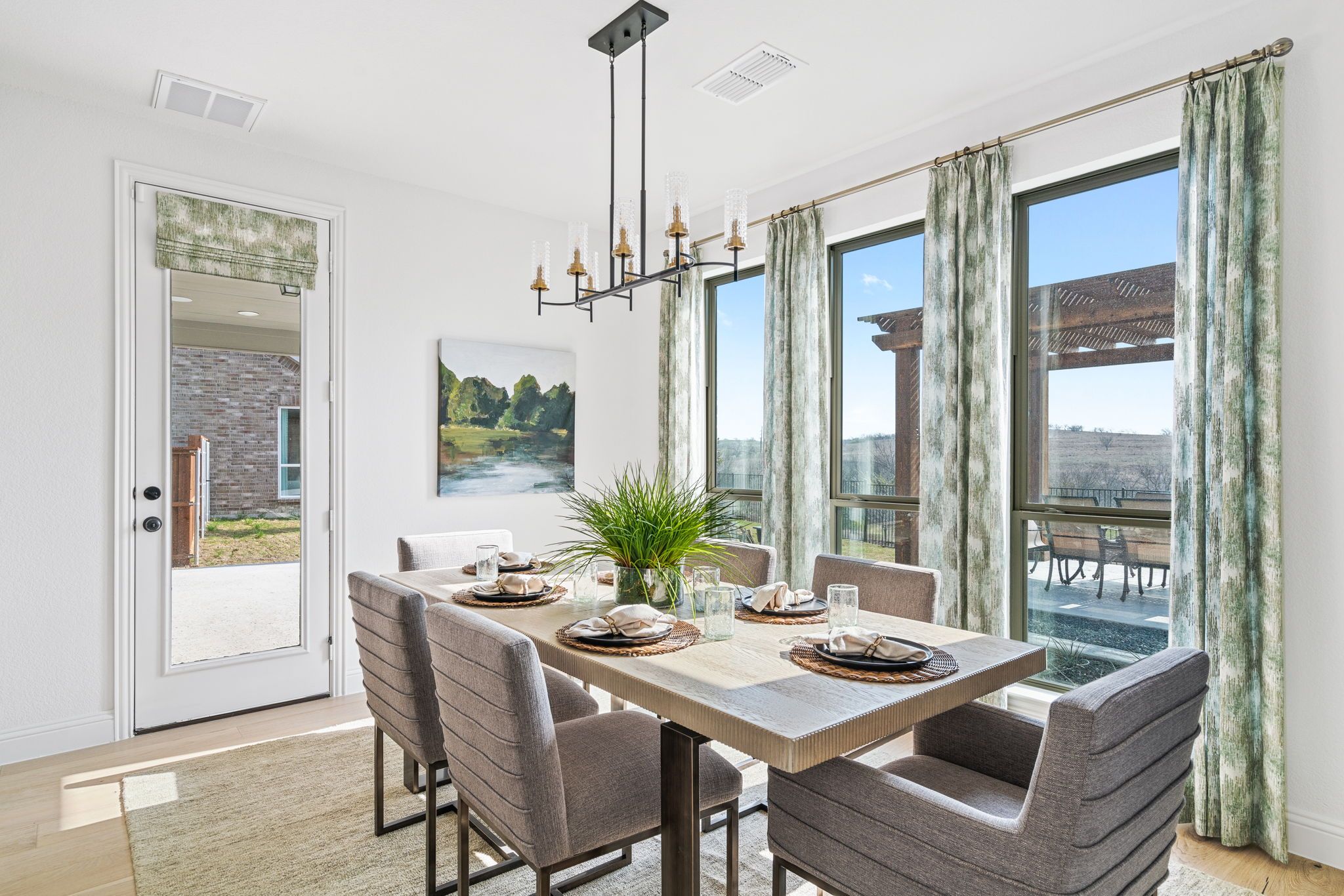 Plan 1686 Dining Room Photo by American Legend Homes