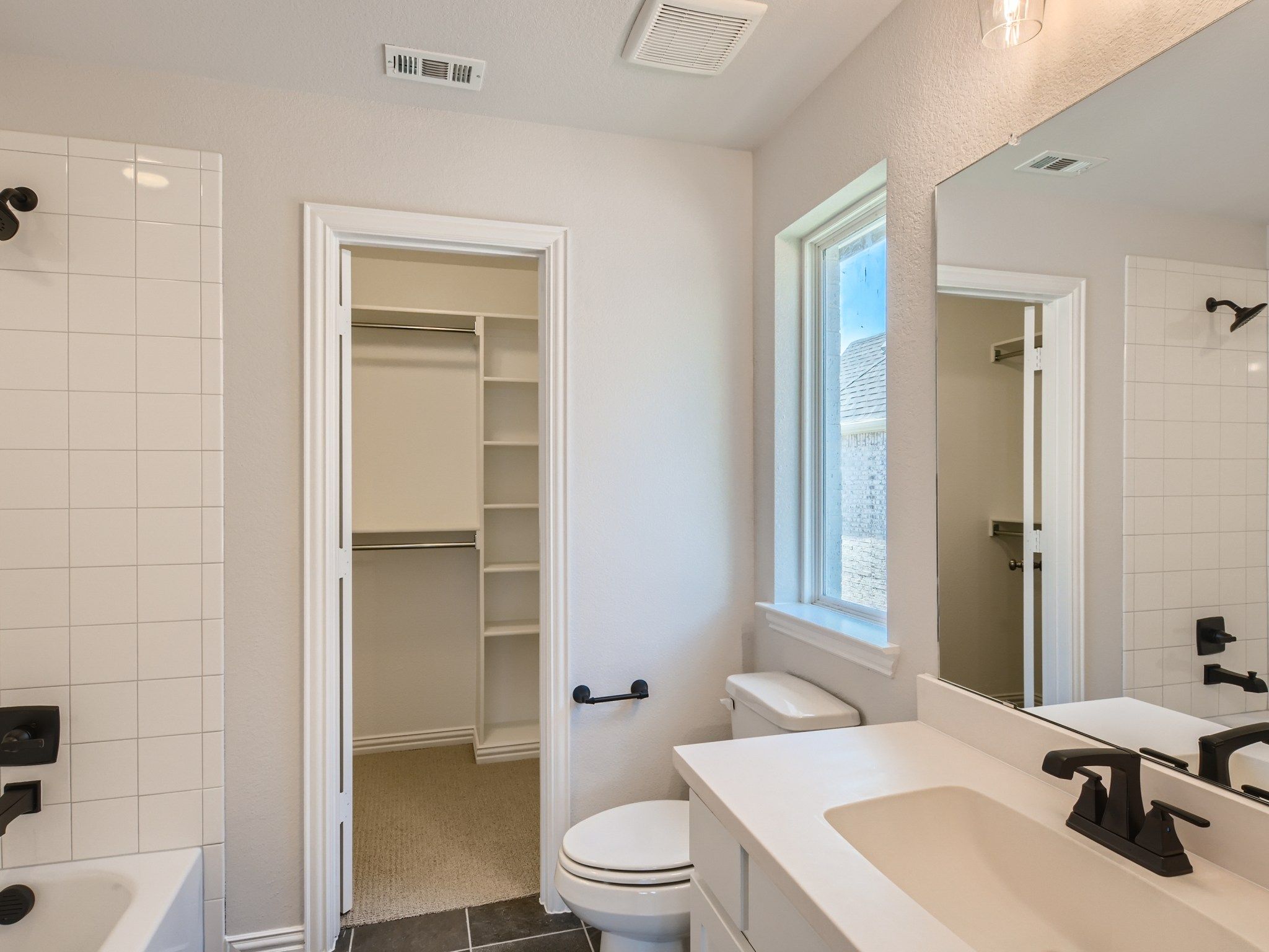 Plan 694 Secondary Bathroom Representative Photo