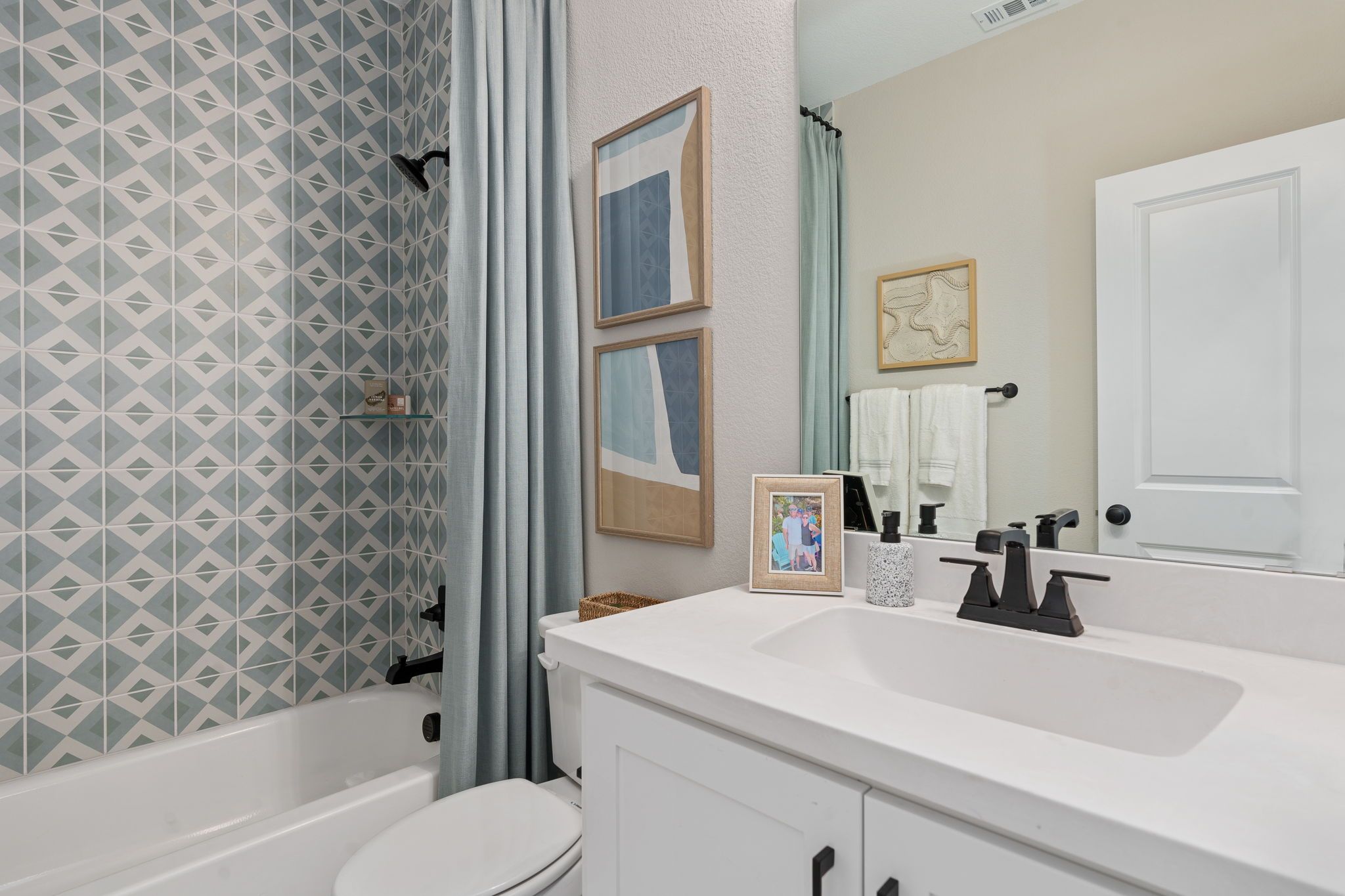 Plan 1534 Secondary Bathroom Representative Photo by American Legend Homes