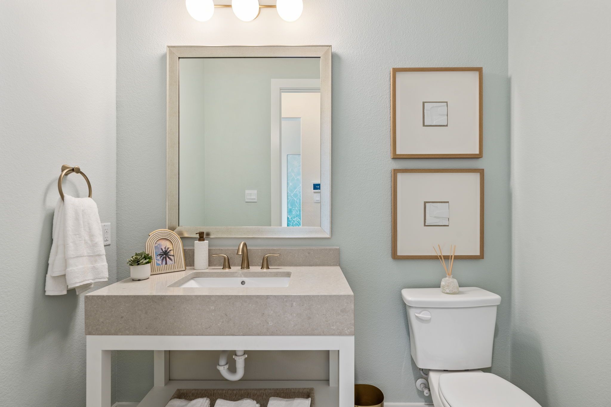 Plan 1640 Powder Bath - Mosaic 60s Model - Photo by American Legend Homes