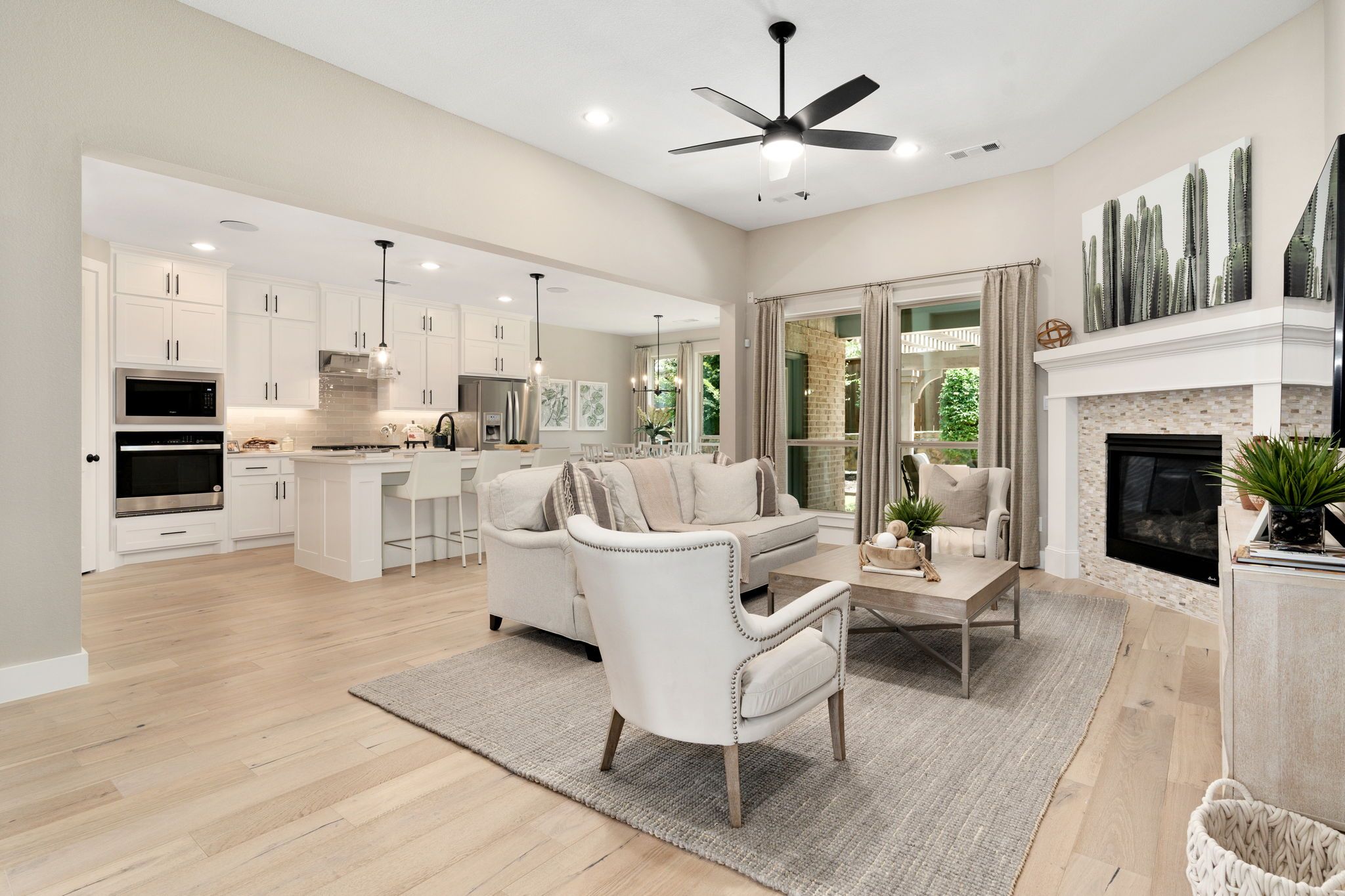 Plan 1685 Living/Kitchen Representative Photo by American Legend Homes