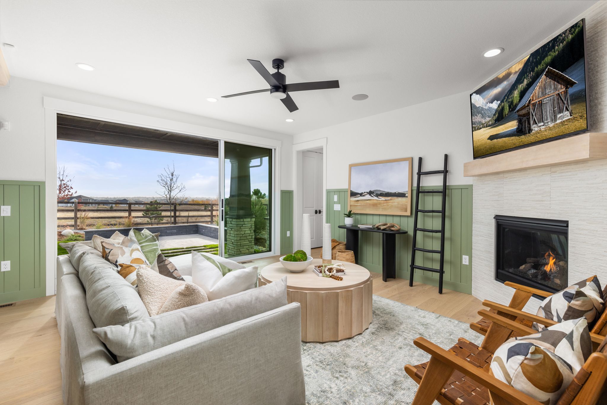 Barefoot Lakes Model Home – Plan V433 Living Room, Furnished in White & Green