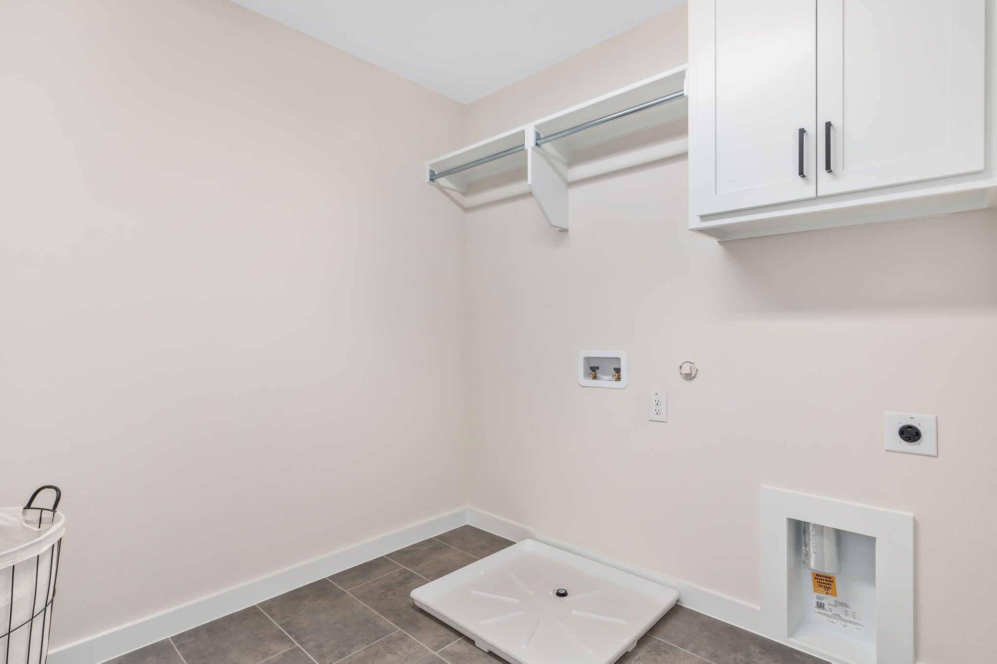 Castle Hills Northpointe Townhomes Laundry Room by American Legend Homes