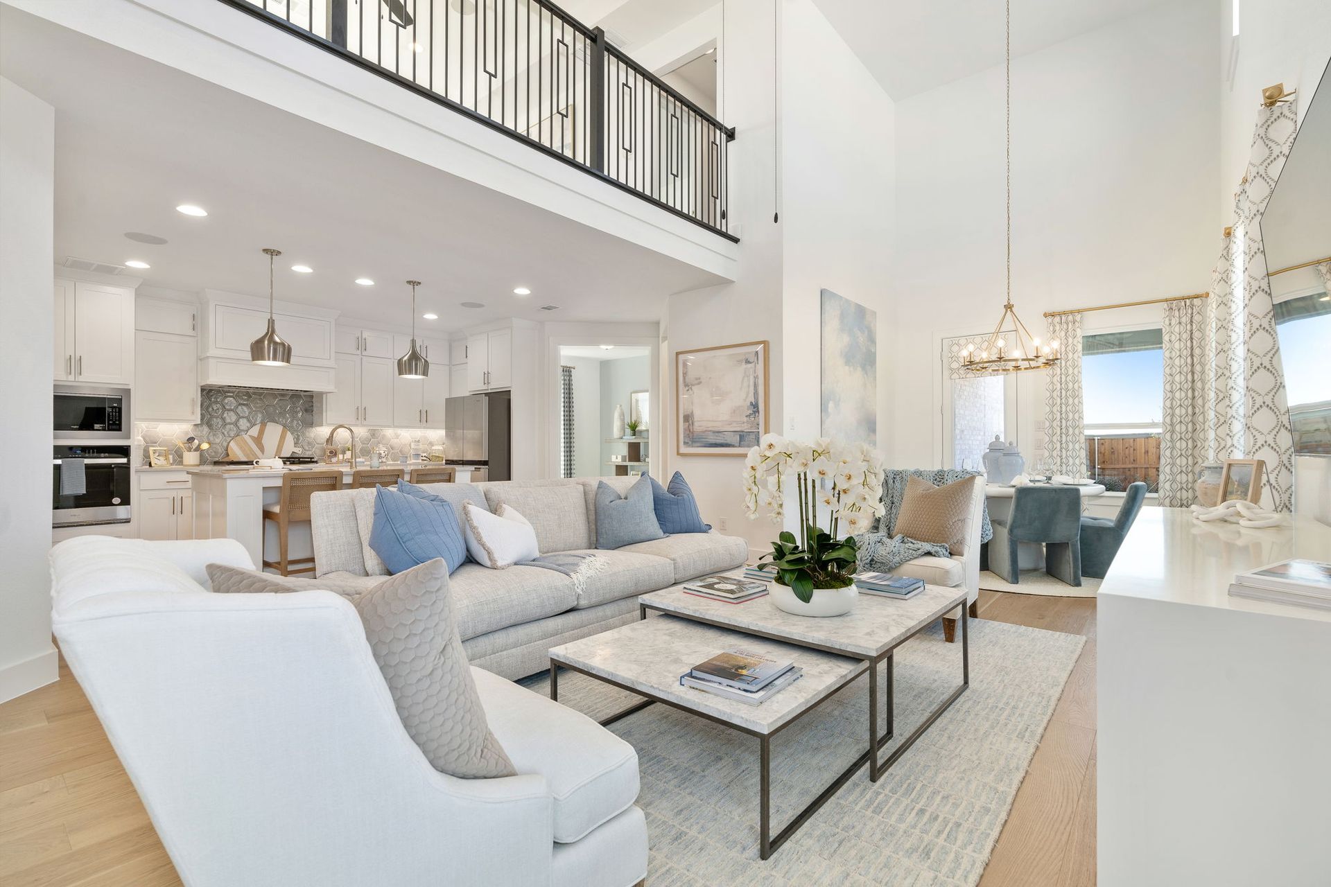 Plan 1456 Ventana American Legend Homes' Model Living/Dining/Kitchen Area
