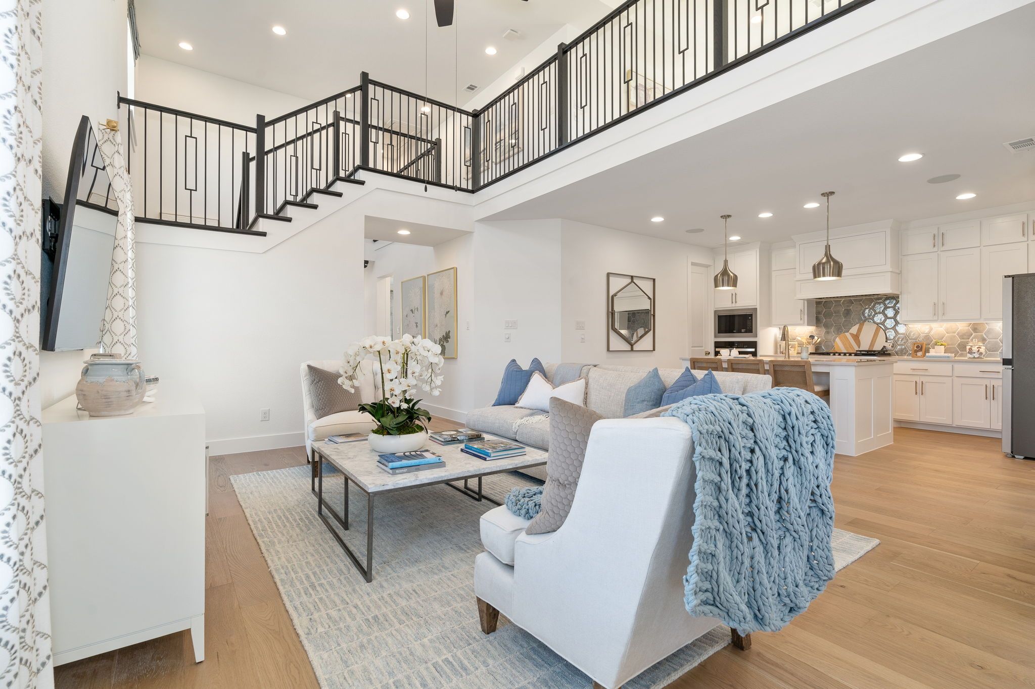 Plan 1456 Ventana American Legend Homes' Model Living/Kitchen/Stairs