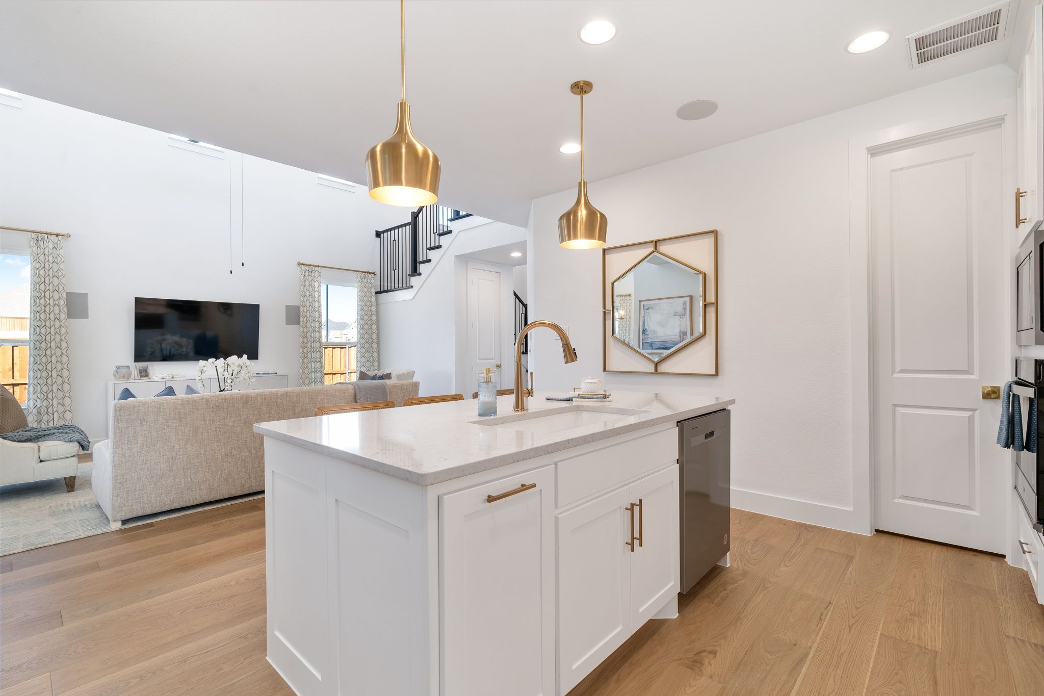 Plan 1456 Ventana American Legend Homes' Model Kitchen/Living Area