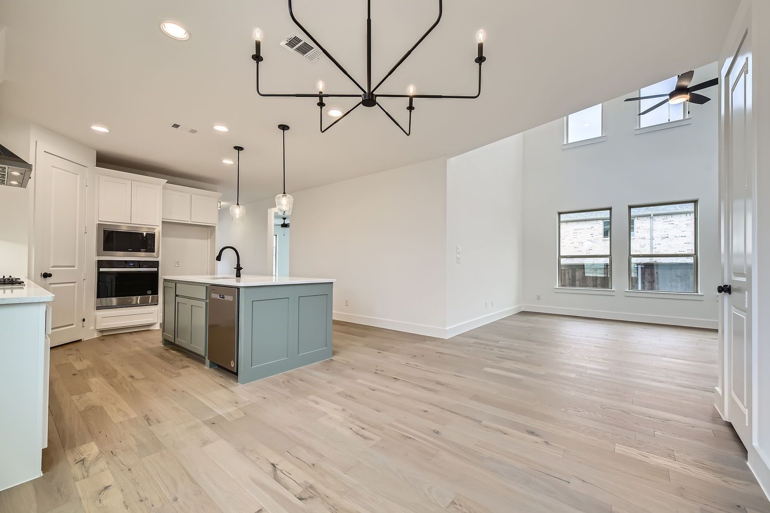 Plan 1455 Kitchen/Living Area Representative Photo