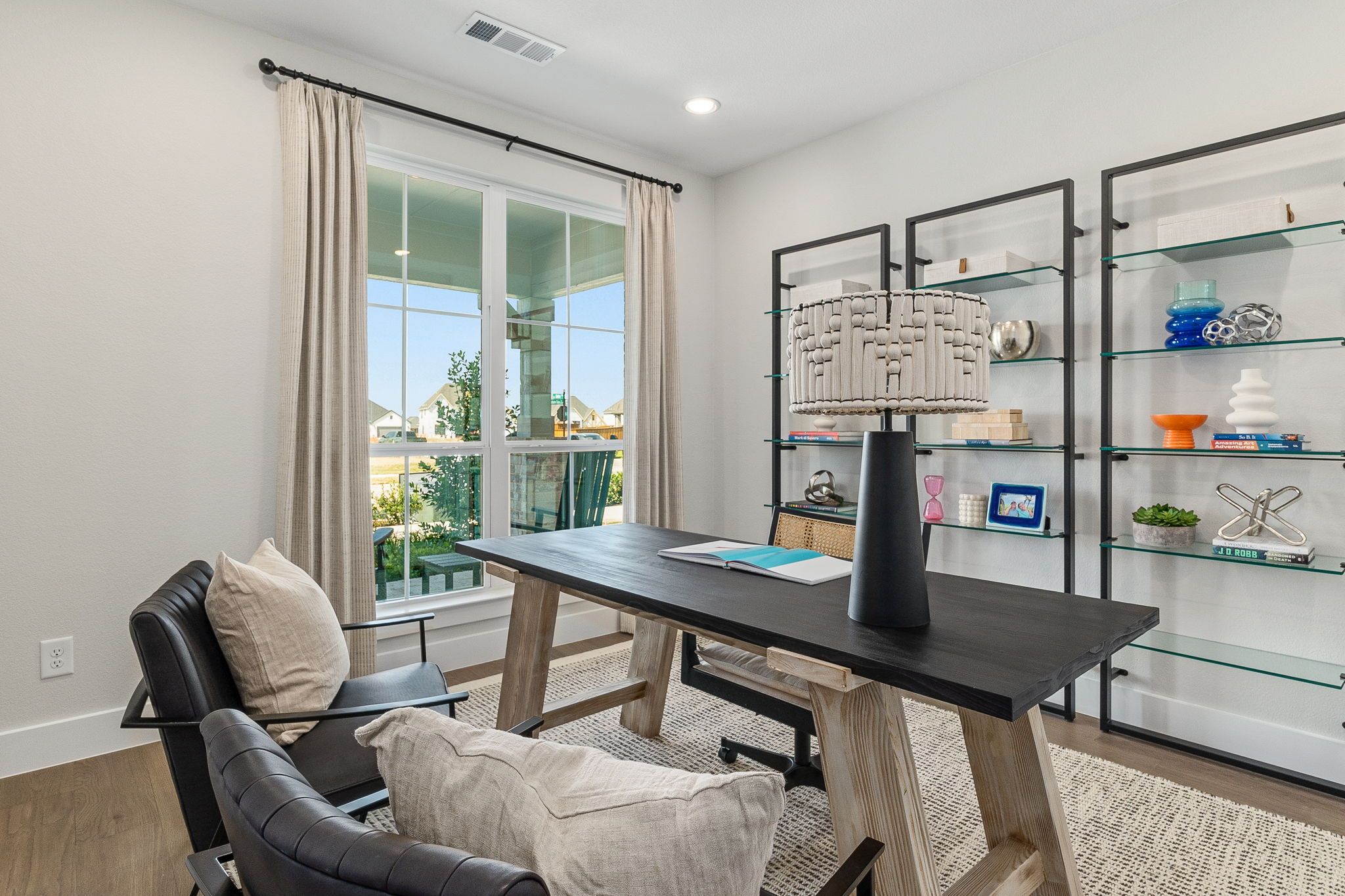 Plan 1542 Home Office Representative Photo by American Legend Homes