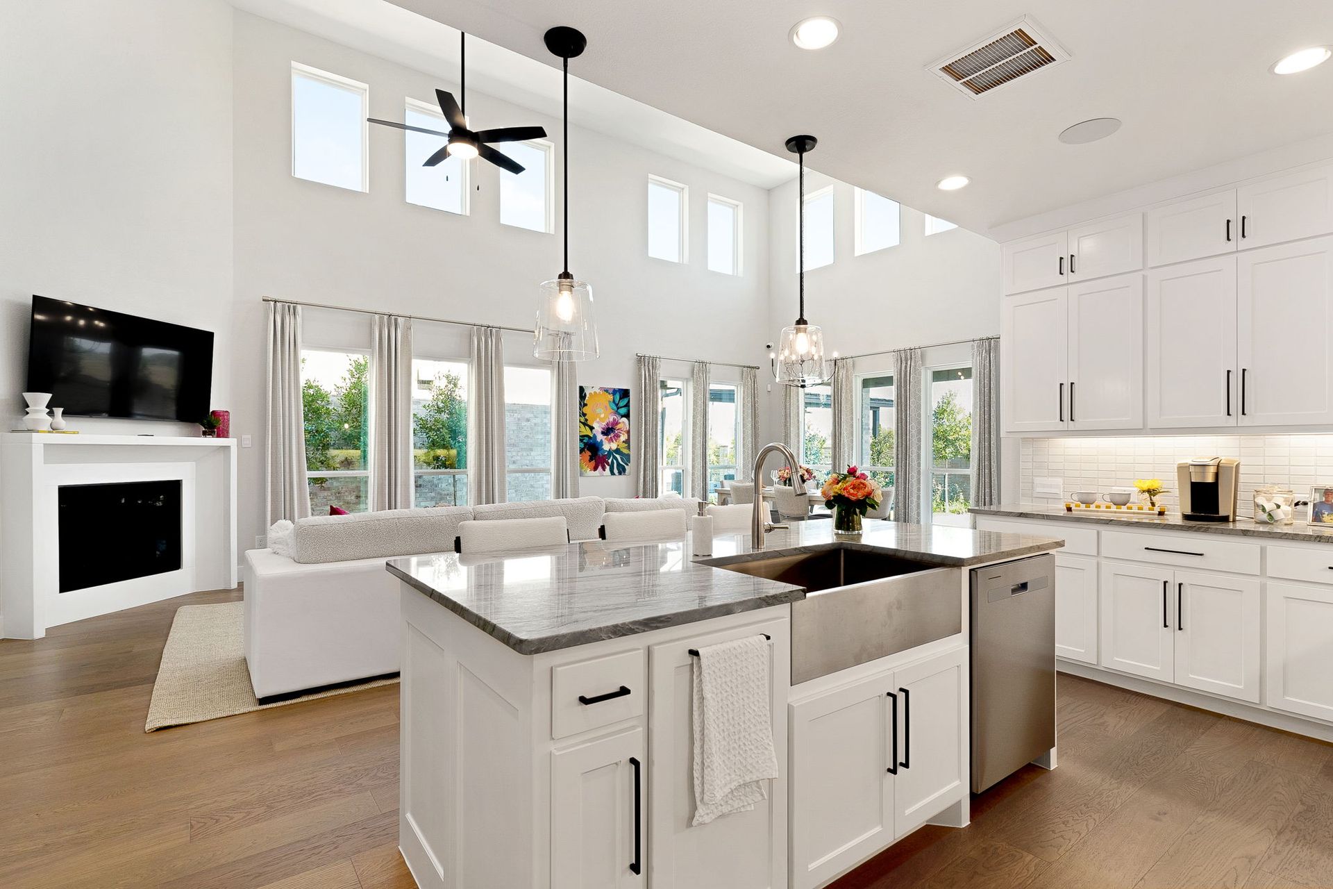 Plan 1542 Kitchen/Dining/Living Area Representative Photo by American Legend Homes