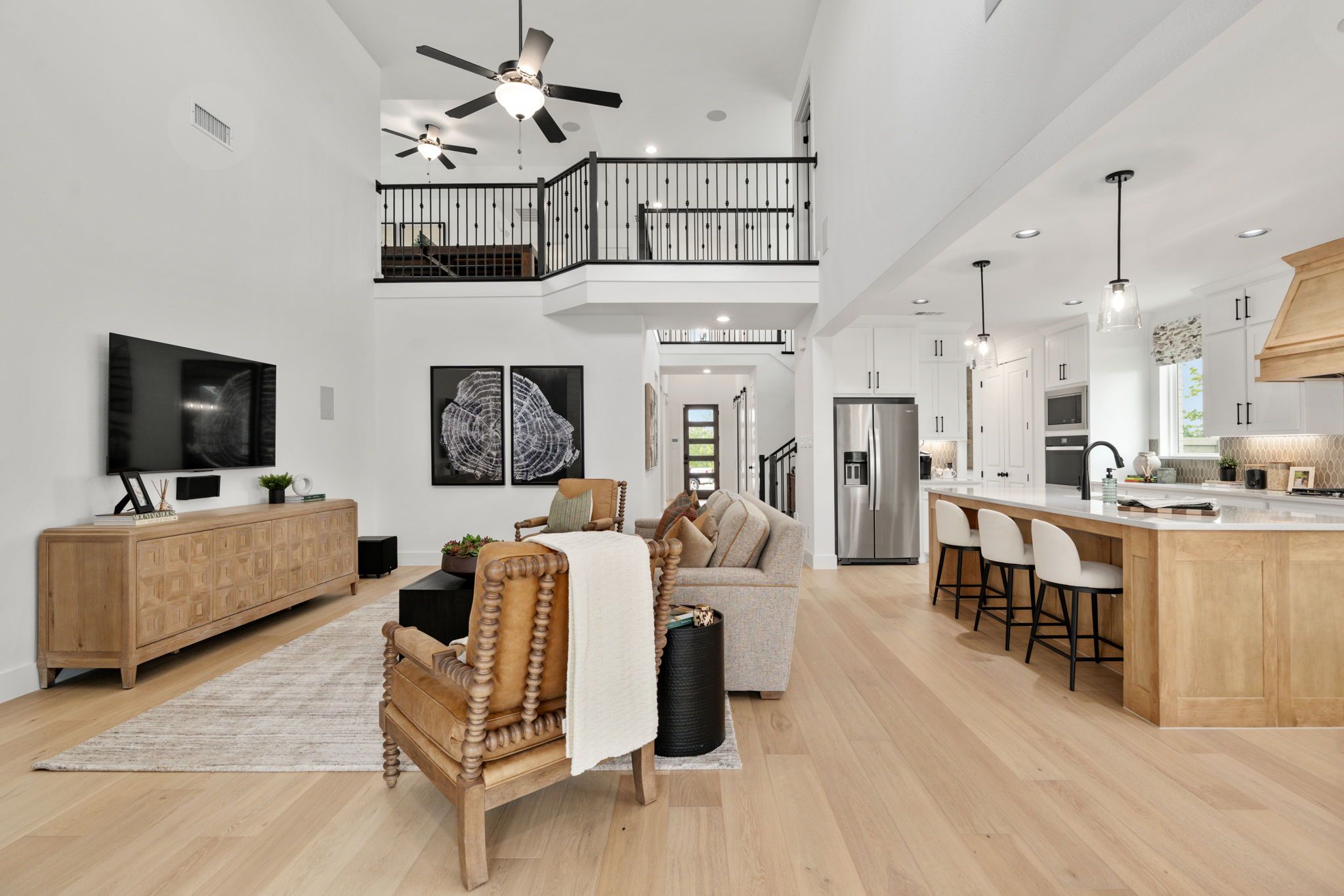 American Legend Homes' model in Treeline - Living Room/Kitchen