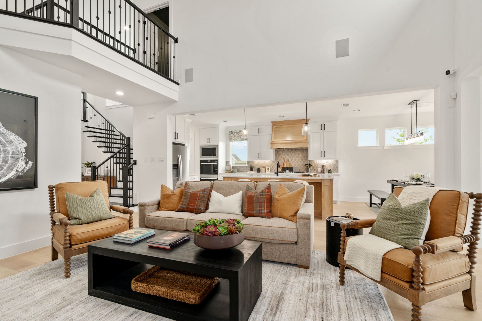 American Legend Homes' model in Treeline - Living Room/Kitchen