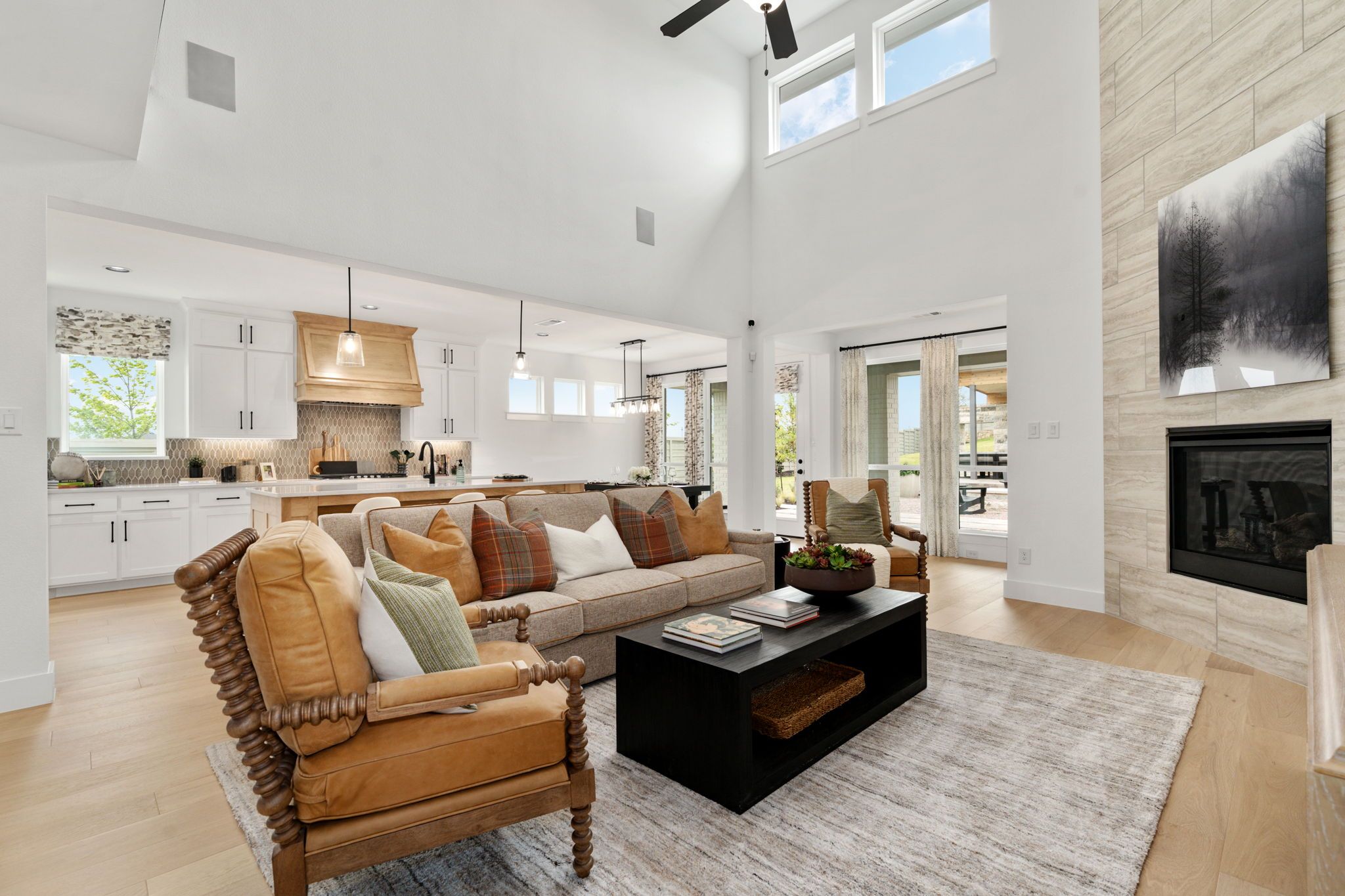 American Legend Homes' model in Treeline - Living Room/Kitchen