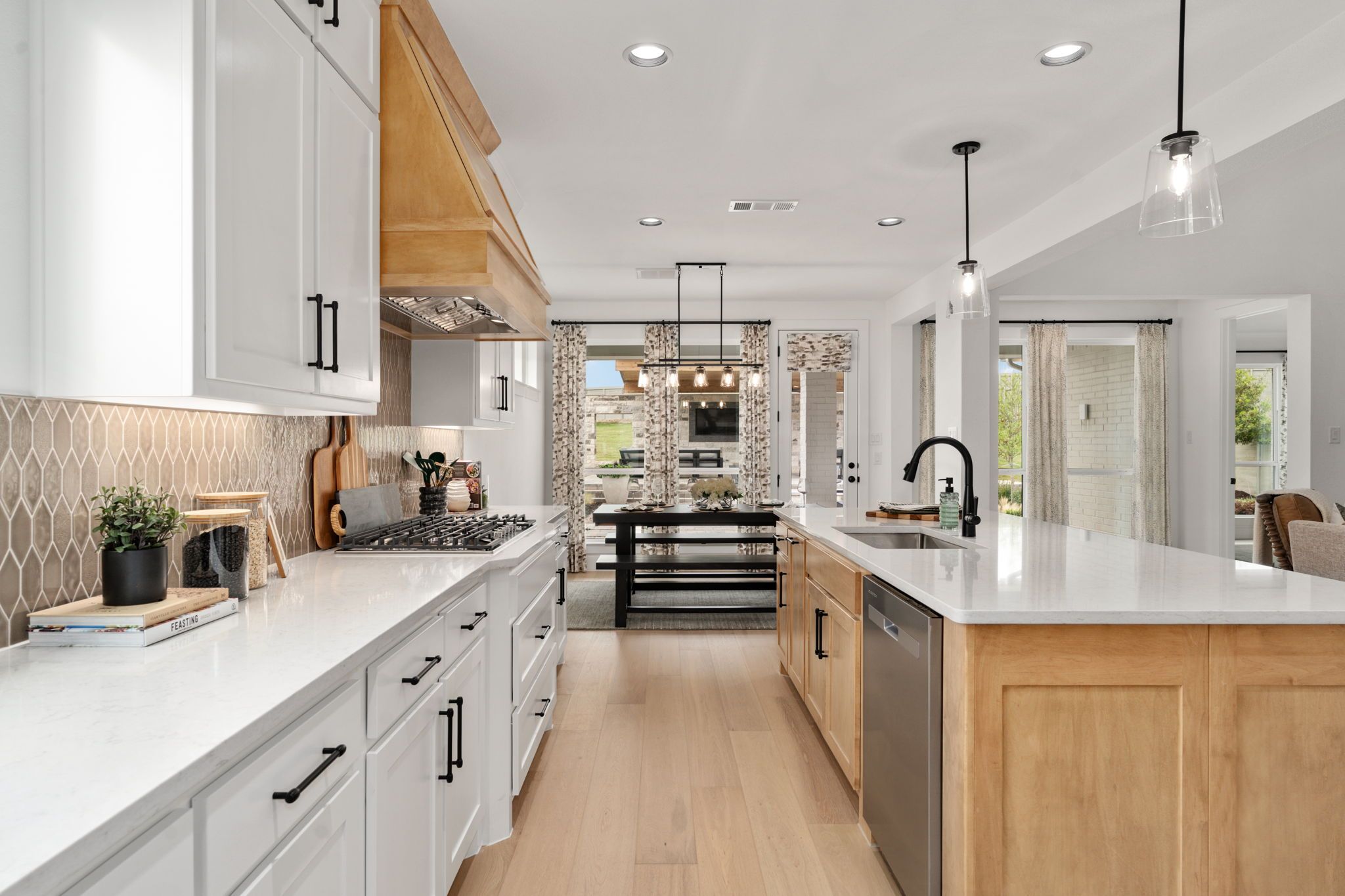 American Legend Homes' model in Treeline - Kitchen/Dining Area