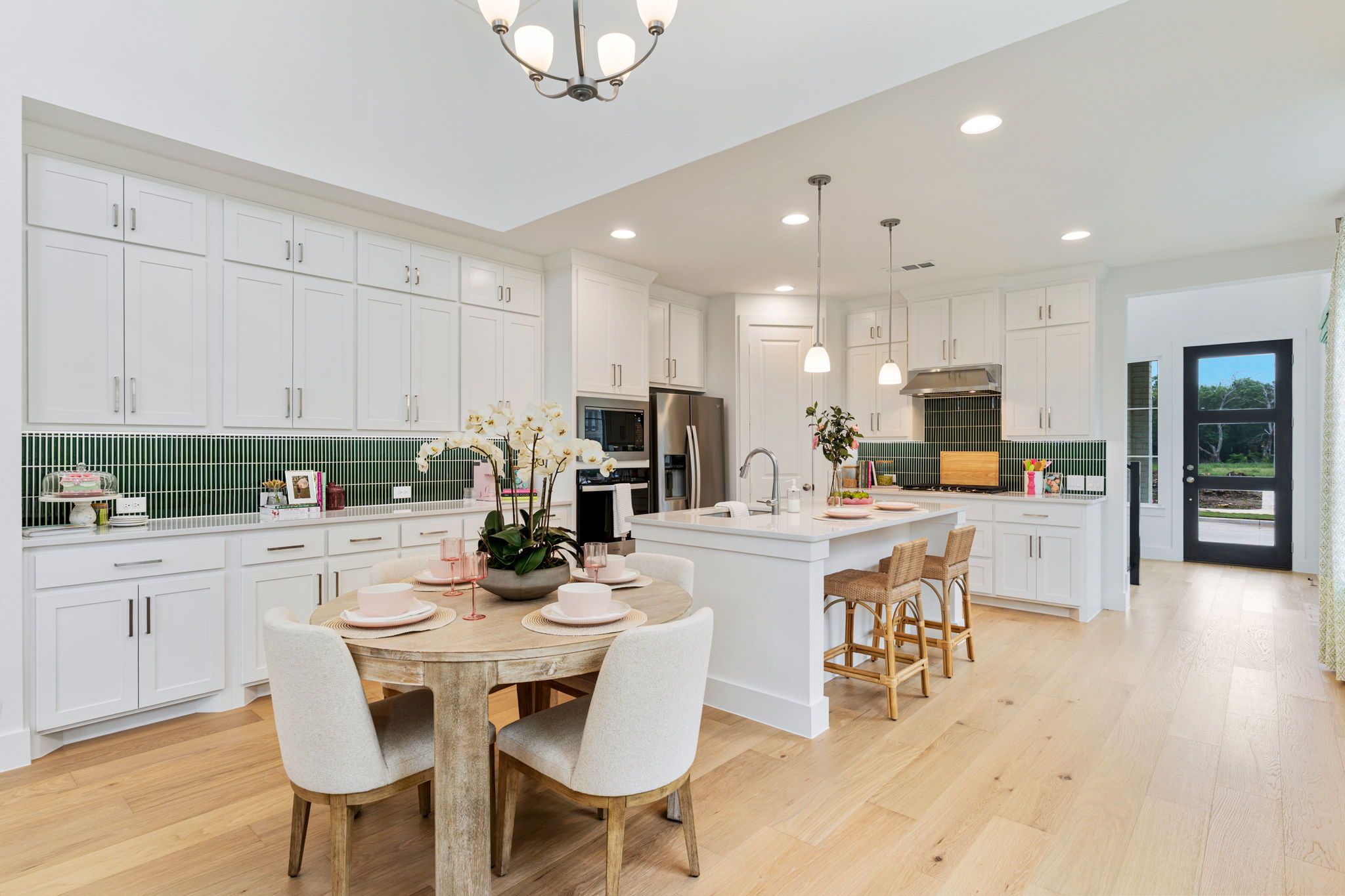 American Legend Homes' 40' model in Wellington - Kitchen/Dining Area