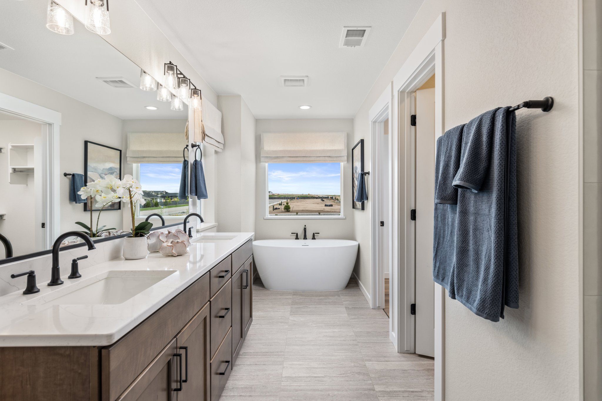 American Legend Homes' 40' Model in Sterling Ranch - Main Bathroom