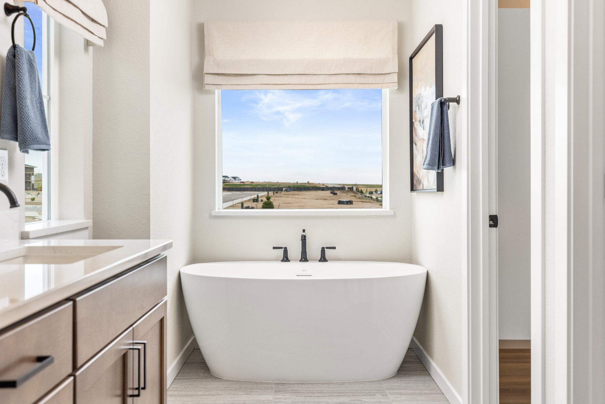 American Legend Homes' 40' Model in Sterling Ranch - Main Bathroom