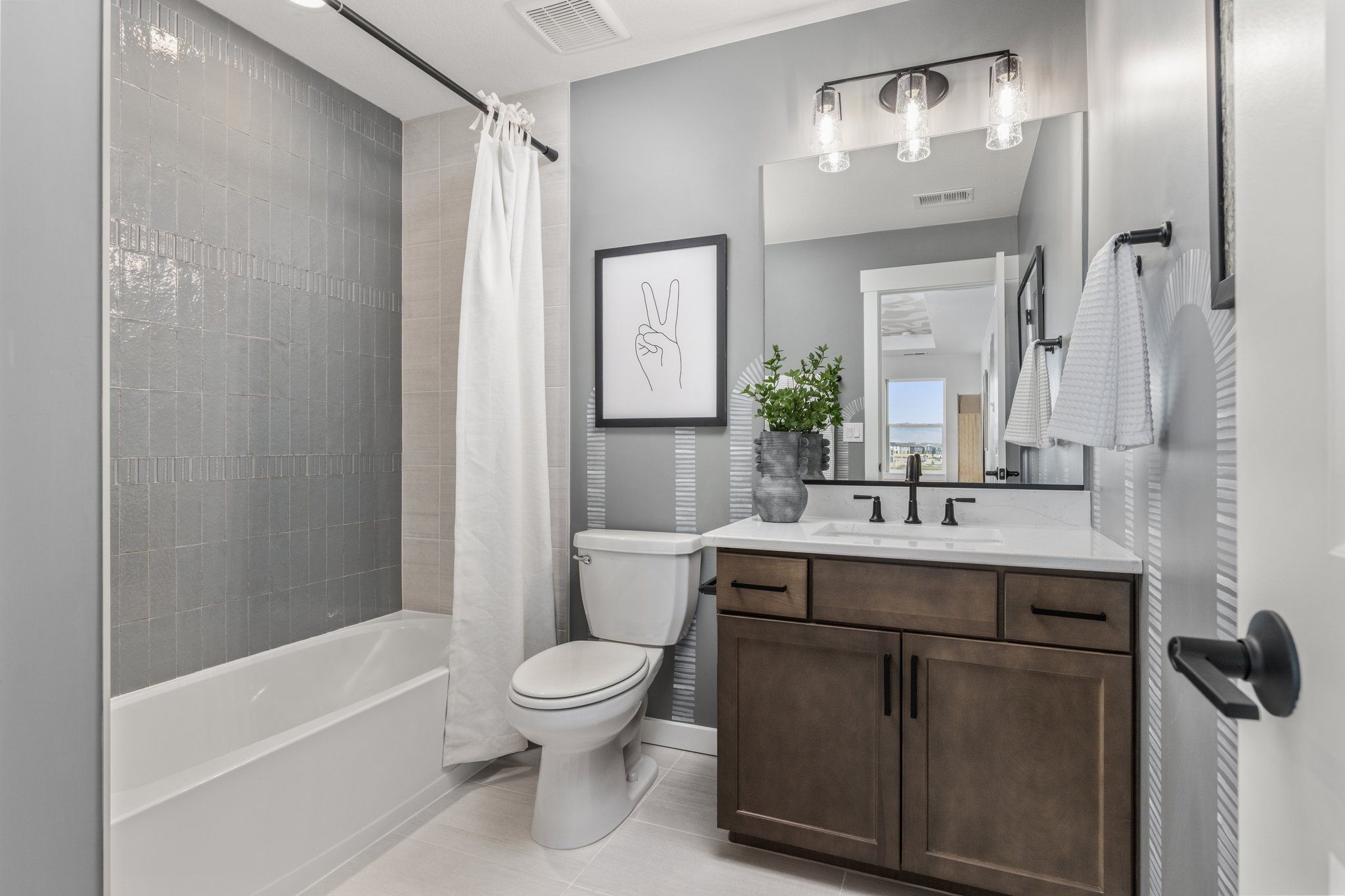 American Legend Homes' 40' Model in Sterling Ranch - Secondary Bathroom