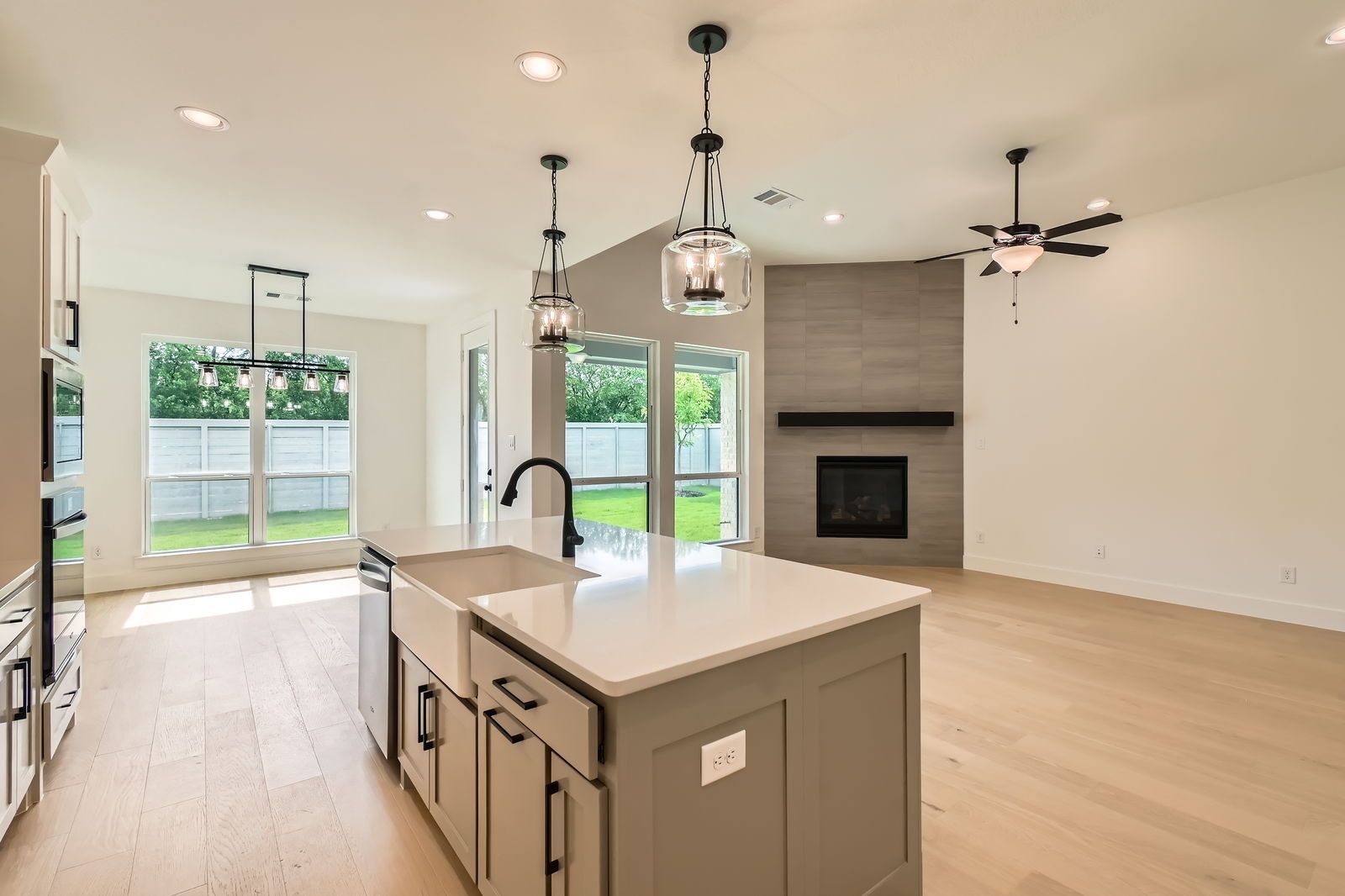 Plan 1560 Representative Photo - Kitchen/Living Room/Dining Area