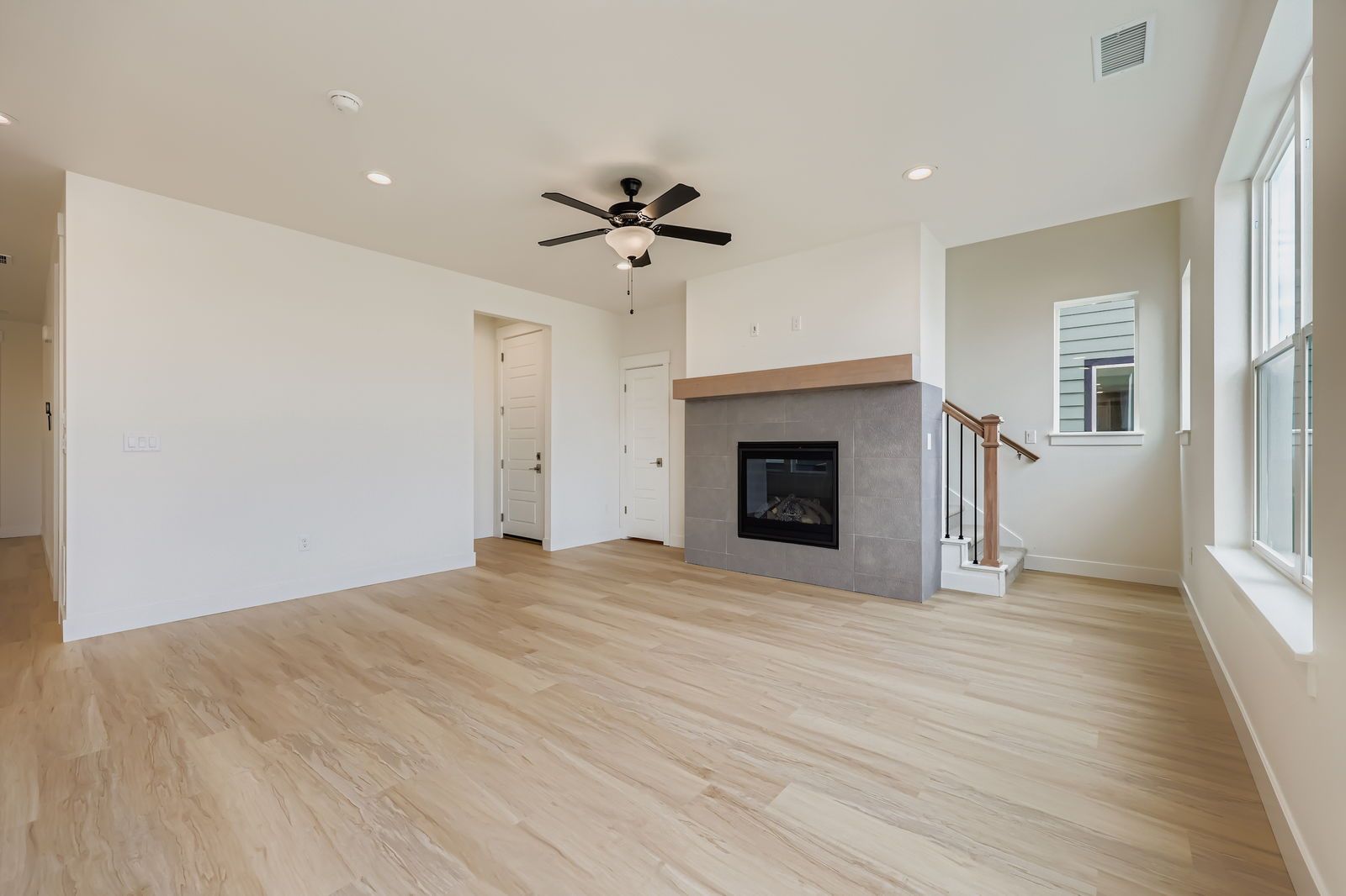 Plan C301 Representative Photo | Spacious Living Area with Modern Finishes