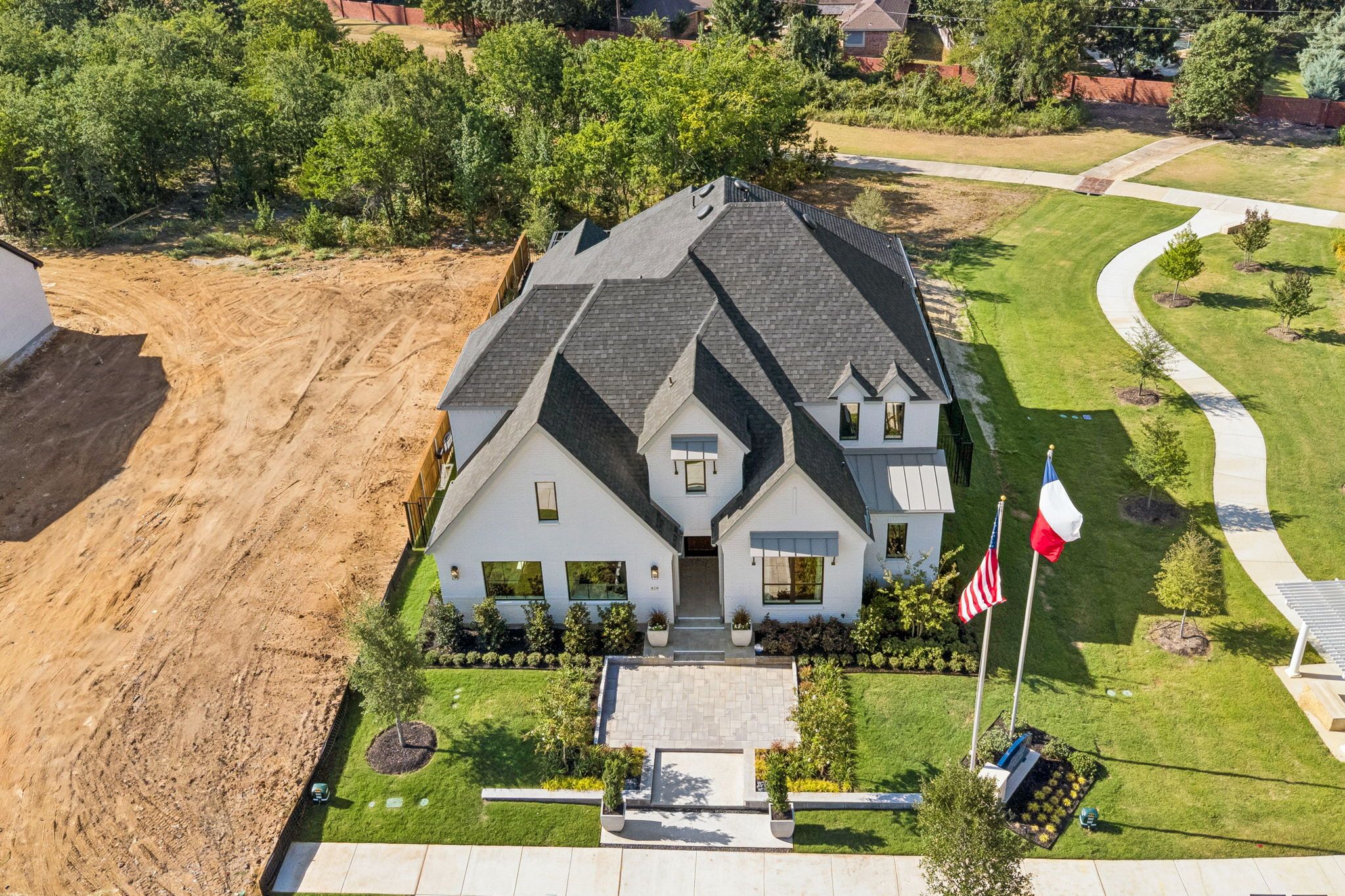 Plan 1640 Aerial Elevation - Bella Casa Model Photo