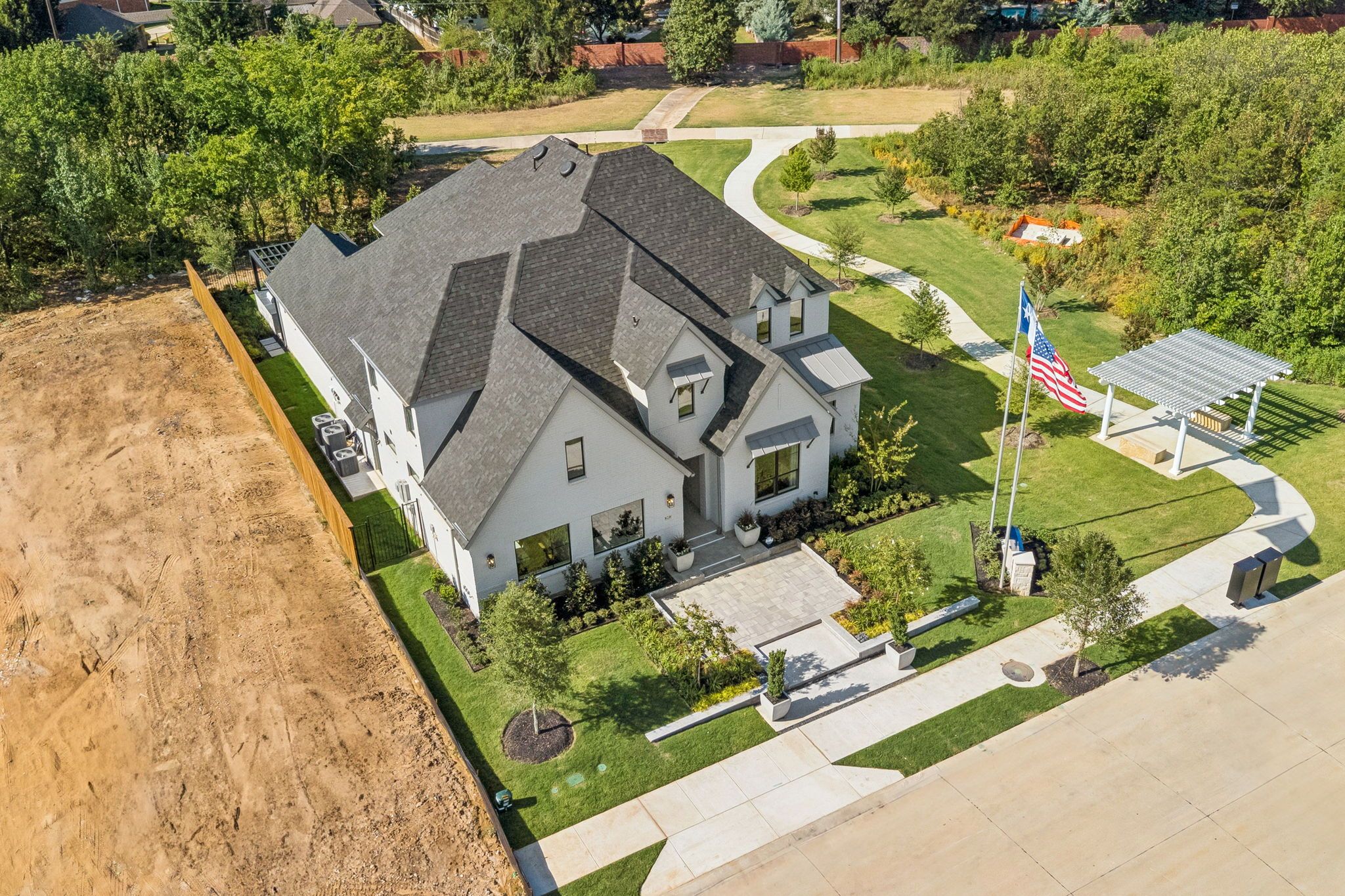 Plan 1640 Aerial Elevation - Bella Casa Model Photo