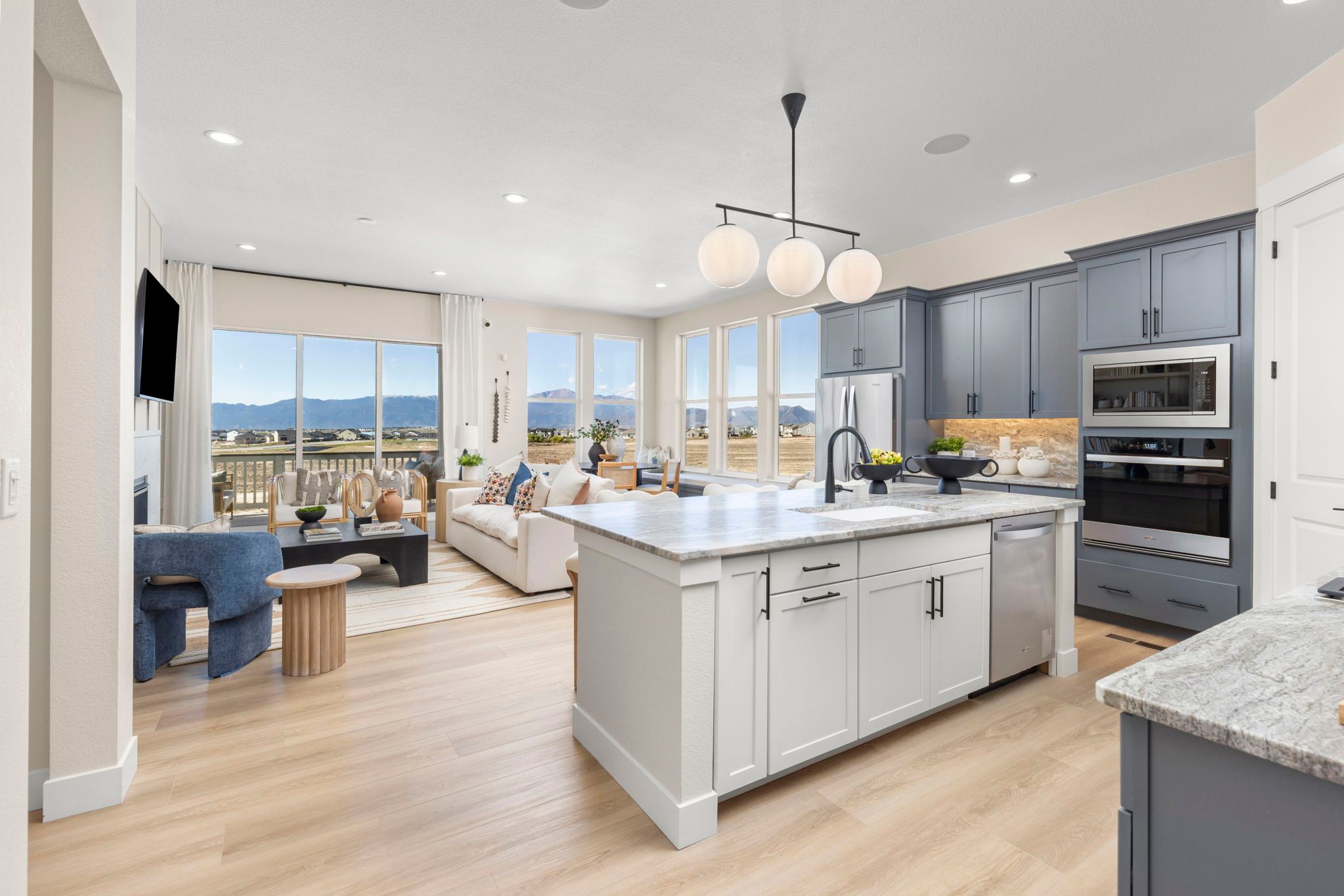 Plan C411 - American Legend Homes' Model in Sterling Ridge - Open Concept Kitchen, Living and Dinin