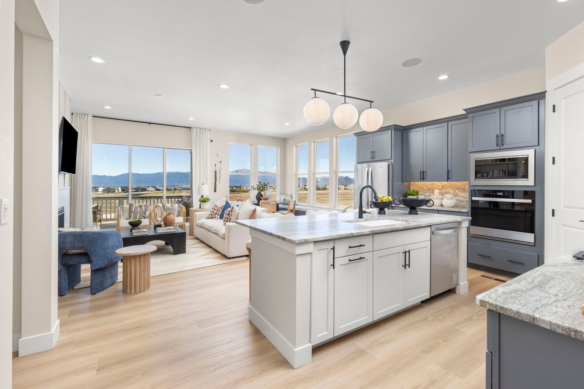 Plan C411 - American Legend Homes' Model in Sterling Ridge - Open Concept Kitchen, Living and Dinin