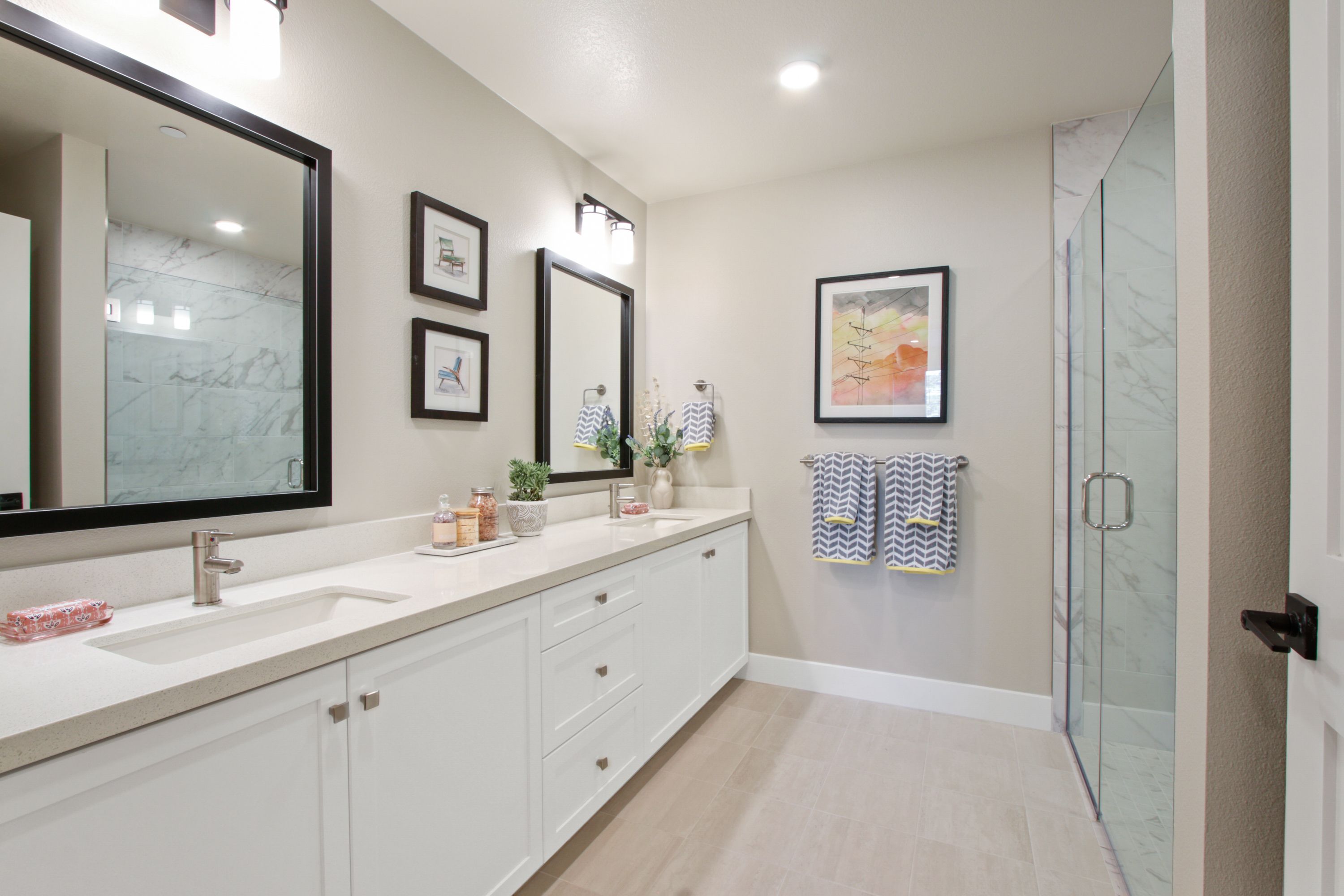 Dual sinks and over-sized walk-in shower. 
