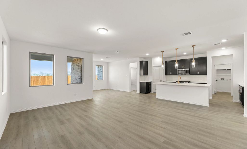 Open Kitchen-Living-Dining Room featuring the Oxford Collection