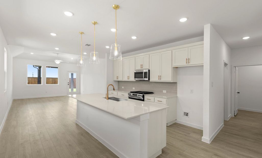 Open Kitchen-Living-Dining Room featuring the Serene Collection