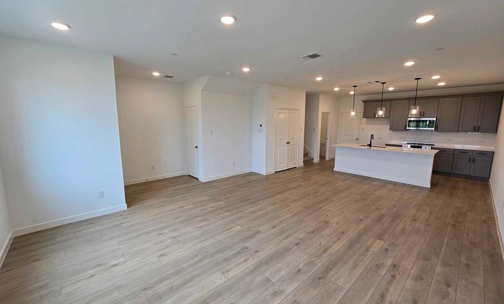 Open Kitchen-Living-Dining Room Construction Progress featuring the Minimalist Collection