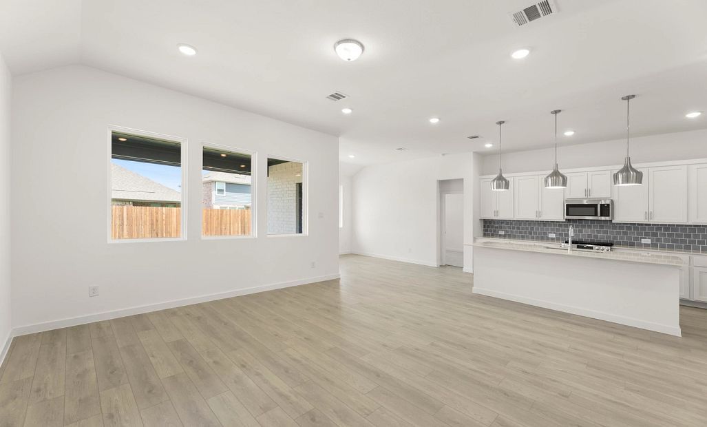 Open Kitchen-Living-Dining Room featuring the Coastal Collection
