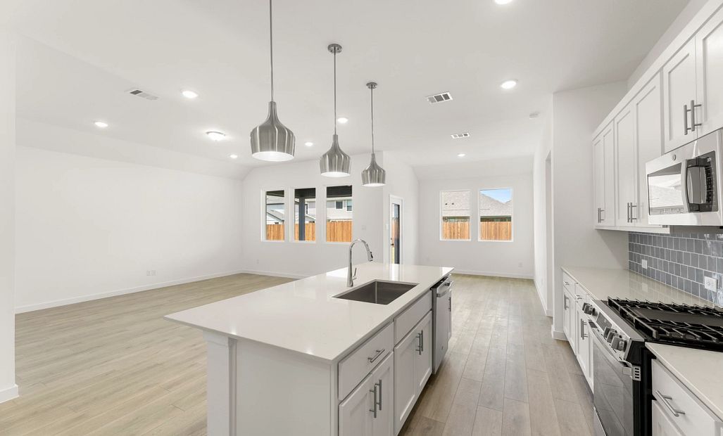 Open Kitchen-Living-Dining Room featuring the Coastal Collection