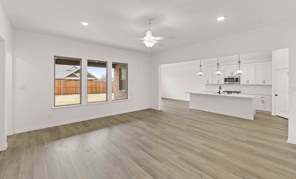 Open Kitchen-Living-Dining Room Representative Photo featuring the Harmony Collection