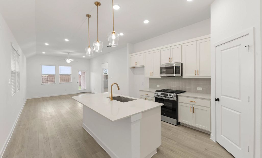 Open Kitchen-Living-Dining Room featuring the Serene Collection