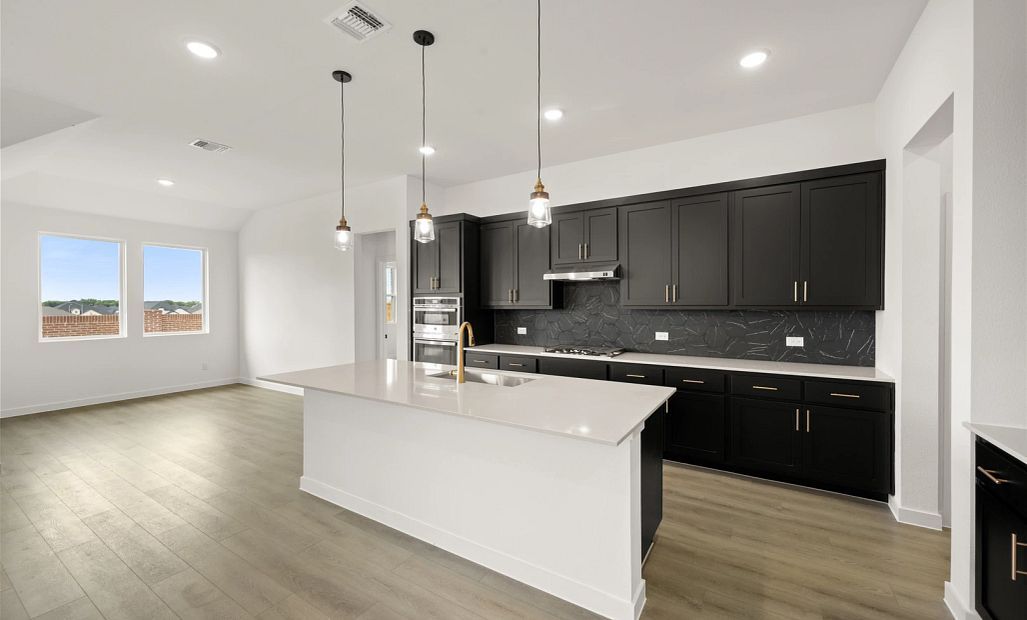 Open Kitchen-Dining Room featuring the Noir Collection
