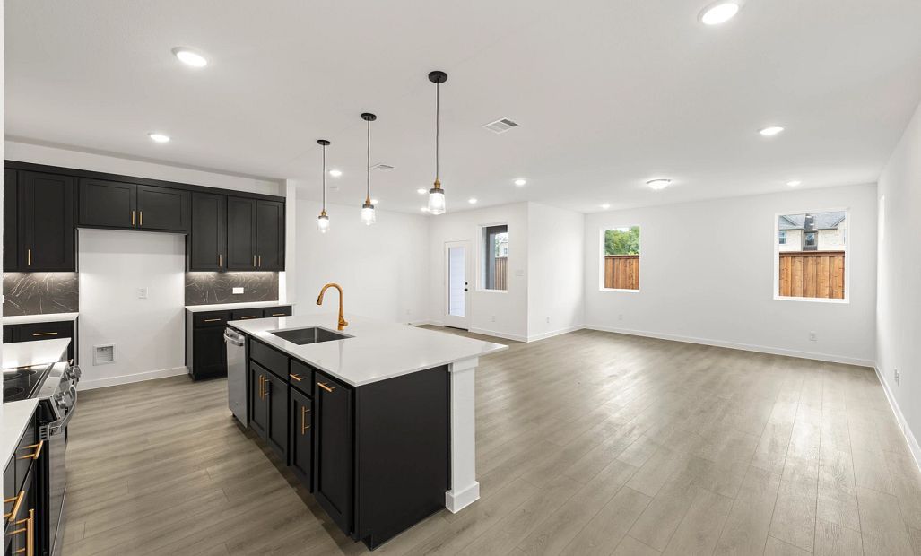 Open Kitchen-Living-Dining Room Representative Photo featuring the Noir Collection