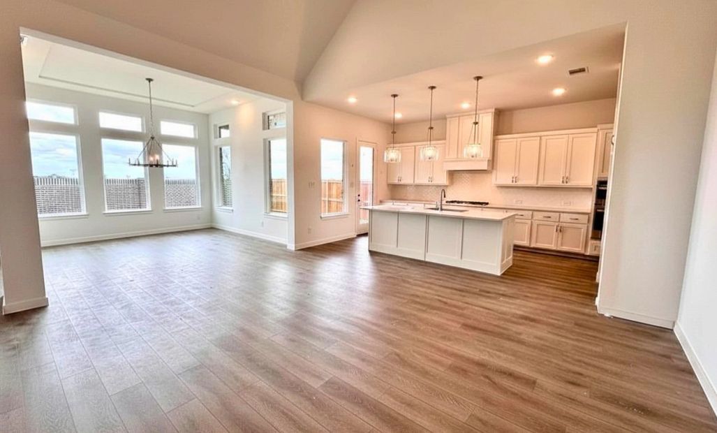 Open Kitchen-Living-Dining Room Construction Progress featuring the Timeless Collection