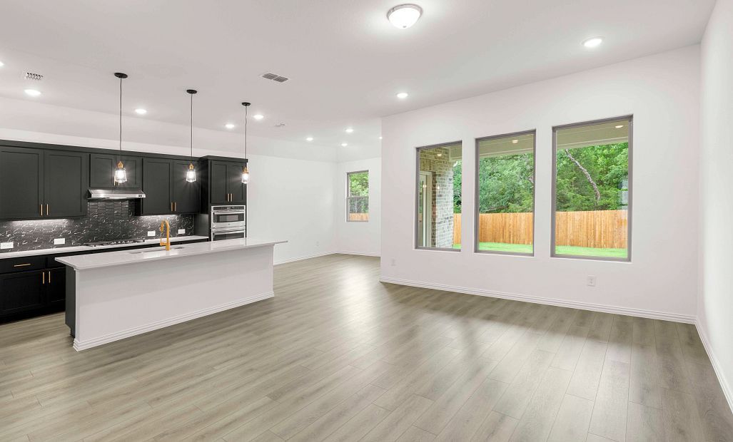 Open Kitchen-Living-Dining Room Representative Photo featuring the Noir Collection