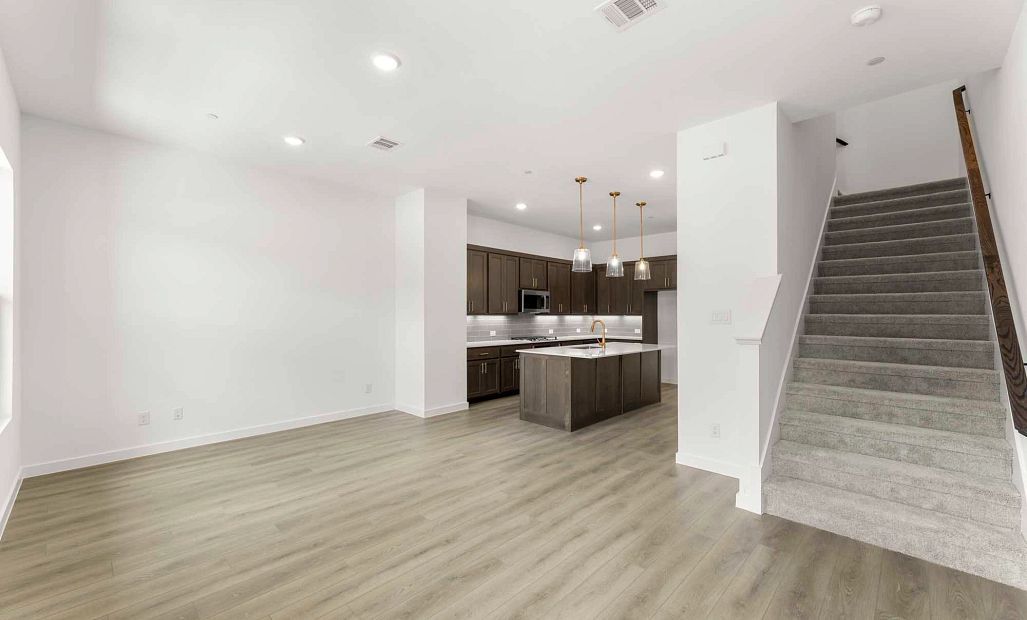 Open Kitchen-Living-Dining Room featuring the Laguna Collection