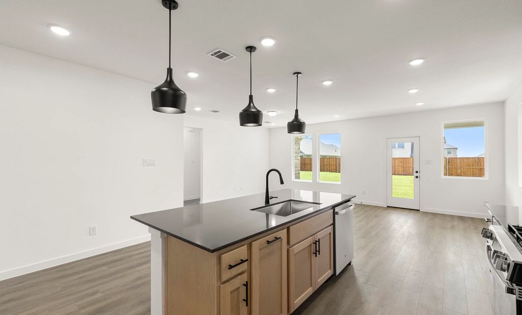 Open Kitchen-Living-Dining Room featuring the Foundry Collection